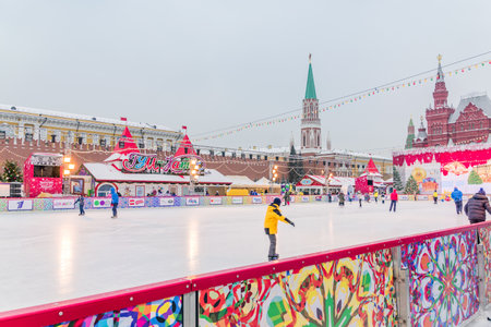 Moscow, Russia - December 20, 2018: People skating on Winter skating rink on Christmas Fair at the Red Squareのeditorial素材