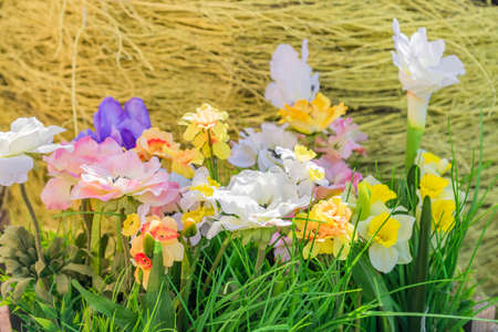 artificial blooming spring flowers. Decoration for easter celebrationの写真素材