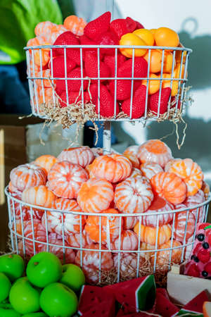 handmade soap in shape of various fruits - tangerine, strawberry, applem watermelon