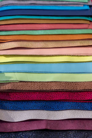 Leather samples of different colors for interior design and craft. Background texture.の写真素材