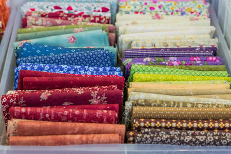 Assortment of natural fabrics and textiles. DIY materiials for craft and scrapbooking. Sewing industry conceptの写真素材