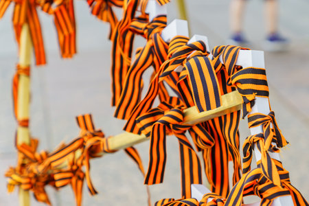 Many of St. George's ribbon tied on the white metal construction as symbol of the Great Patriotic War and Second World war. May 9. Victory dayのeditorial素材