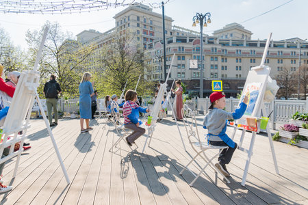 Moscow, Russia - April 25, 2019: Open air workshop. Easter Holiday festival in Moscow. Children paintingのeditorial素材