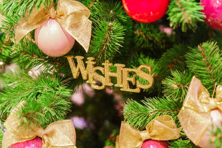 Christmas and ney year background. Close up of fir tree decorations - christmas pink and red balls...
