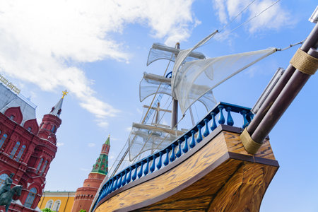 MOSCOW, RUSSIA - MAY 30, 2019: Fish Week, street decoration of Manezhnaya Square. Sails boat against...