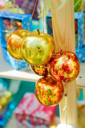 Decorative golden apples for christmas tree decoration.の写真素材