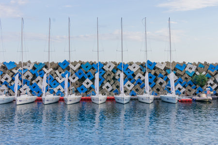 Sochi Adler, Russia - September 7, 2019: group of yachts are parked in the harbor in a summer dayのeditorial素材