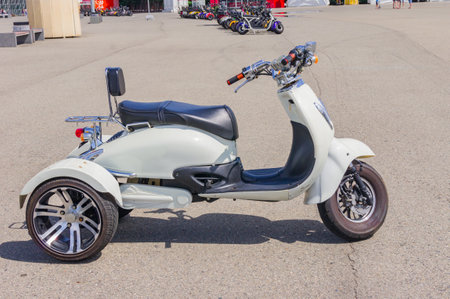 Sochi Adler, Russia - September 7, 2019: Close up of three wheels Electro scooter parked for rentのeditorial素材
