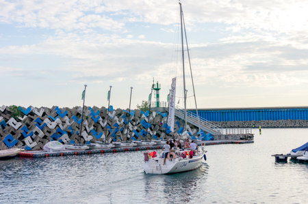 Sochi Adler, Russia - September 7, 2019: group of yachts are parked in the harbor in a summer day