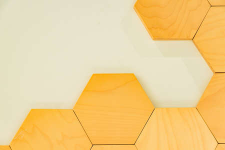 Fragement of interior decoration. Wall with wooden honeycomb. Trendy design.の写真素材