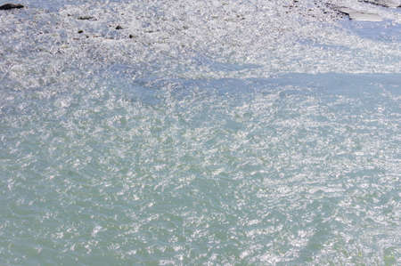 Blue water background. River backdrop