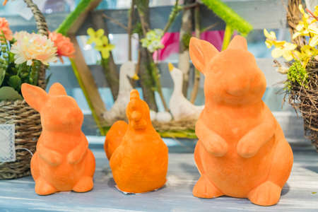 Easter figurines - rabbits and a an on a shop display.の写真素材