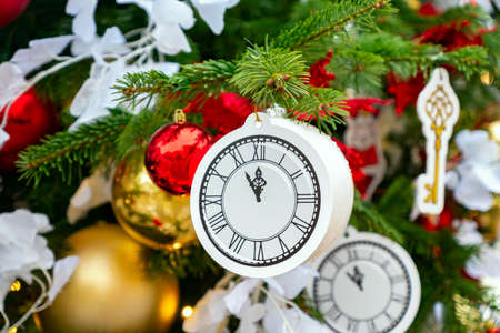 close up of christmas trees decoration with toys and garlands. Festive greeting card for winter...