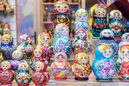 MOSCOW, RUSSIA - December 18, 2019: Set of wooden matrioshka dolls on the shelf. traditional christmas marketのeditorial素材