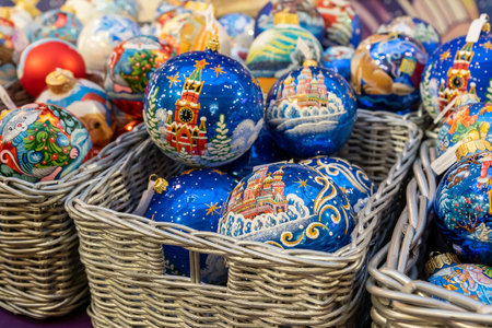 MOSCOW, RUSSIA - December 18, 2019. GUM Main Department Store. New Year and Christmas fair. Close up of christmas toys for sale in baskets. Presents for tourists.のeditorial素材