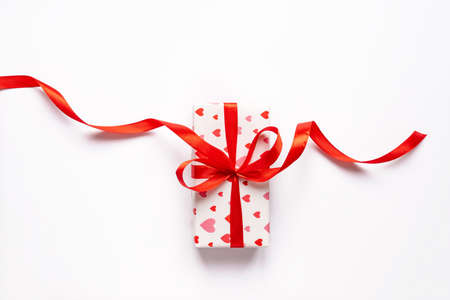 Festive St Valentne's day concept with gift box on white background. Top view, copy space.の写真素材