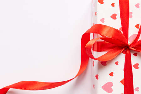Festive St Valentne's day concept with gift box on white background. Top view, copy space.の写真素材