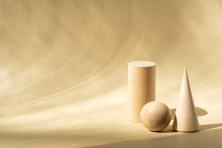 wooden greometric shapes on beige background. Can be used for podiums or display of your products. Copy space for textの写真素材