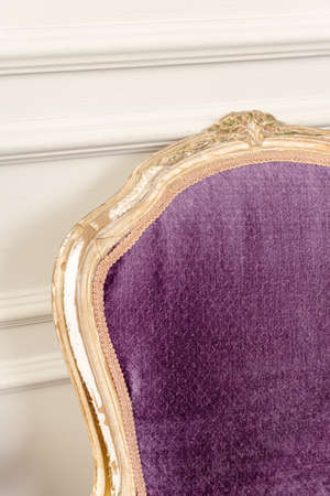 Purple Vintage classical farbirc style Chair indoors.