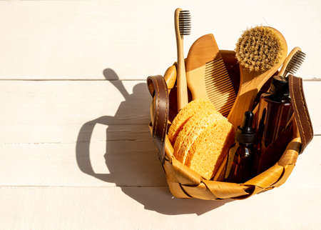 set of various bath accessories. Face brush, soap, comb, oil, shampoo and sponges. The view from the top with coppy space.の写真素材