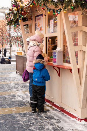 MOSCOW, RUSSIA - DECEMBER 15, 2020: Christmas fair pavilion on Red Square. Presents and souvenirs for tourists.のeditorial素材