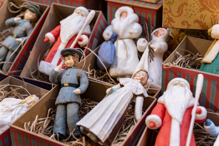 MOSCOW, RUSSIA - December 15, 2020. GUM Main Department Store. New Year and Christmas fair. Close up of christmas toys of Sviet ficurines for sale in boxes. Presents for touristsのeditorial素材