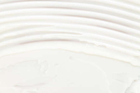 White cream or body lotion texture background with copy space. cosmetic texture background. Cream...