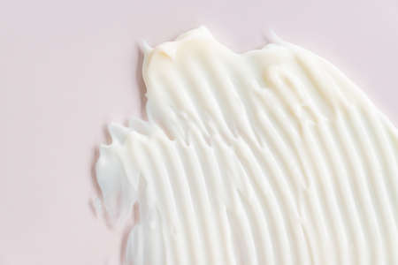 Cream lotion texture. White moisturizer, skincare cosmetic product smear background. Space for text.