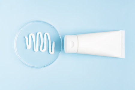 Natural organic cosmetic packaging mock up. Hand cream or lotion for softening skin. cream texture in petri dishの写真素材