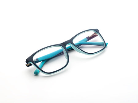 childrens glasses on white background. Corrective spectacles for boys with eye issues. Glasses with...