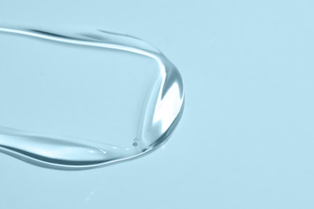 Cosmetic gel serum smear stroke texture. luxury minimalism. Sunlight, skin care product still life with copy space.の写真素材