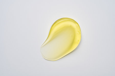 Pure transparent cosmetic gel smear on white background, skin care glycerin texture. top view.の写真素材