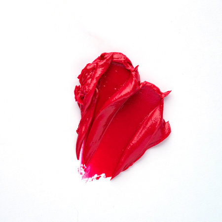 Double Red smear swipe isolated on white background texture beauty lipstick swatch..