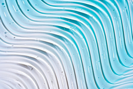 Close-up image displaying blue pure gel texture with glossy highlights and clear droplets, ideal for background useの写真素材