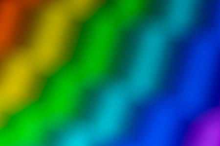 vibrant rainbow spectrum background. Smooth diagonal color transitions with a soft blur effect,...