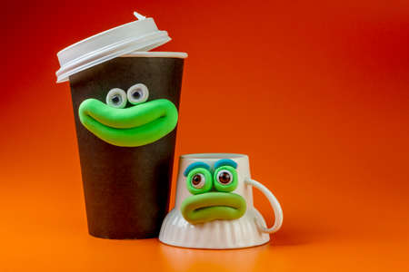 Coffee cup with eyes and smiling mouthの写真素材