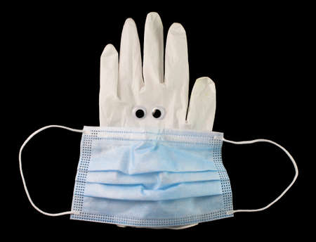 medical mask with medical gloves on the black backgroundの写真素材