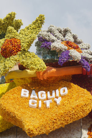 White font of Baguio City words on yellow Chrysanthemum flowers with other decorative flowers displayed at Baguio Flower Festival. Photo taken in Baguio, Philippines, Southeast Asia on March 1, 2015.のeditorial素材