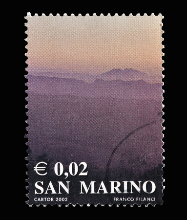 Cancelled postage stamp printed by San Marino, that shows sunset, circa 2002.のeditorial素材