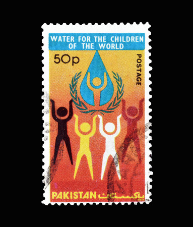 Cancelled postage stamp printed by Pakistan, that shows Water for the children, circa 1977.のeditorial素材