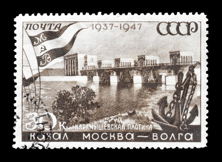 Cancelled postage stamp printed by Russia, that shows Karamyshevsky Dam, circa 1947.のeditorial素材