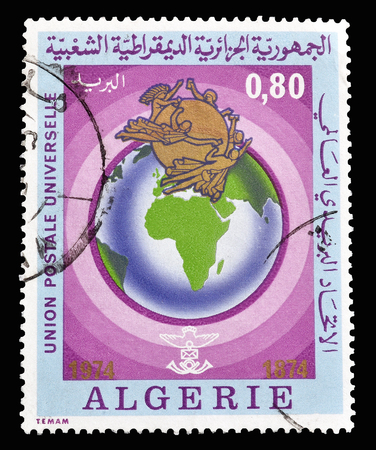 Cancelled postage stamp printed by Algeria, on UPU Centenary, that shows earth, circa 1974.のeditorial素材