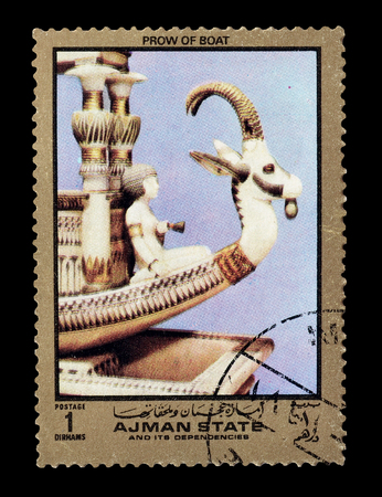 Cancelled postage stamp printed by Ajman state, that shows Prow of boat, circa 1972.のeditorial素材