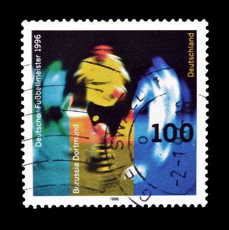 Cancelled postage stamp printed by Germany, that shows Borussia Dortmund football player, circa 1996.のeditorial素材
