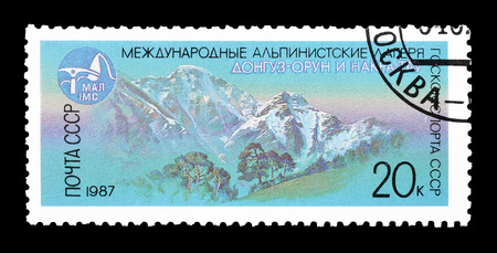 Cancelled postage stamp printed by Soviet Union, that shows Mountains Donguzorun and Nakra tau, circa 1987.のeditorial素材