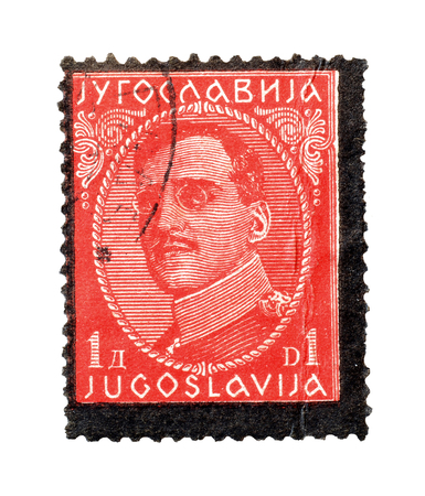 Cancelled postage stamp printed by Yugoslavia, that shows portrait of king Alexander, circa 1934.