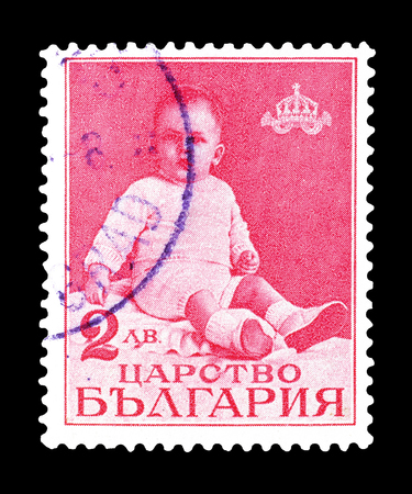 Cancelled postage stamp printed by Bulgaria, that shows prince Simenon as baby, circa 1938.のeditorial素材