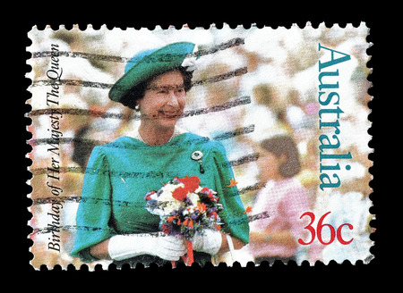 Cancelled postage stamp printed by Australia, that shows Queen Elizabeth II, circa 1987.のeditorial素材