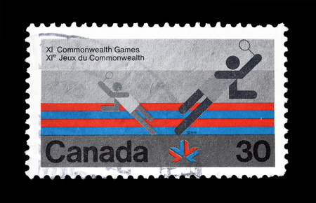 Cancelled postage stamp printed by Canada, that promotes Commonwealth games, circa 1978.のeditorial素材