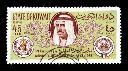 Cancelled postage stamp printed by Kuwait, that shows Sheik Sabah, Arms of WHO and Kuwait, circa 1968.のeditorial素材